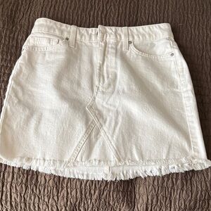 White Denim Mini Skirt with Frayed Hem and Cute Front Detail